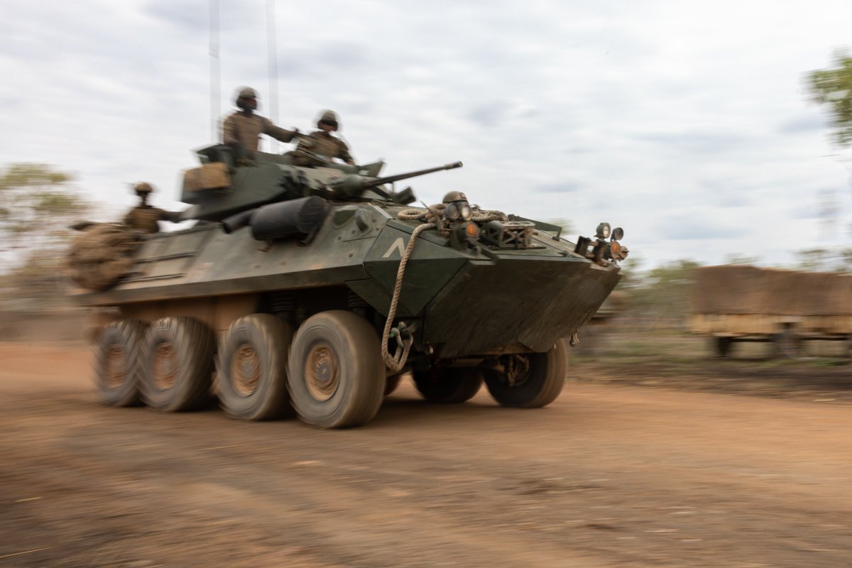 MRFDarwin's tweet photo. Dirty Jobs, Done Dirt Cheap
U.S. #Marines with Alpha Company, 1st Light Armored Reconnaissance Battalion, @1st_Marine_Div, prepare to drive LAV-25 Light Armored Vehicles during Exercise Predator’s Run 24 at Mount Bundey Training Area, NT, Australia.
#LAR #LAV #MRFD #REDEX https://t.co/hXuN5HHeO9