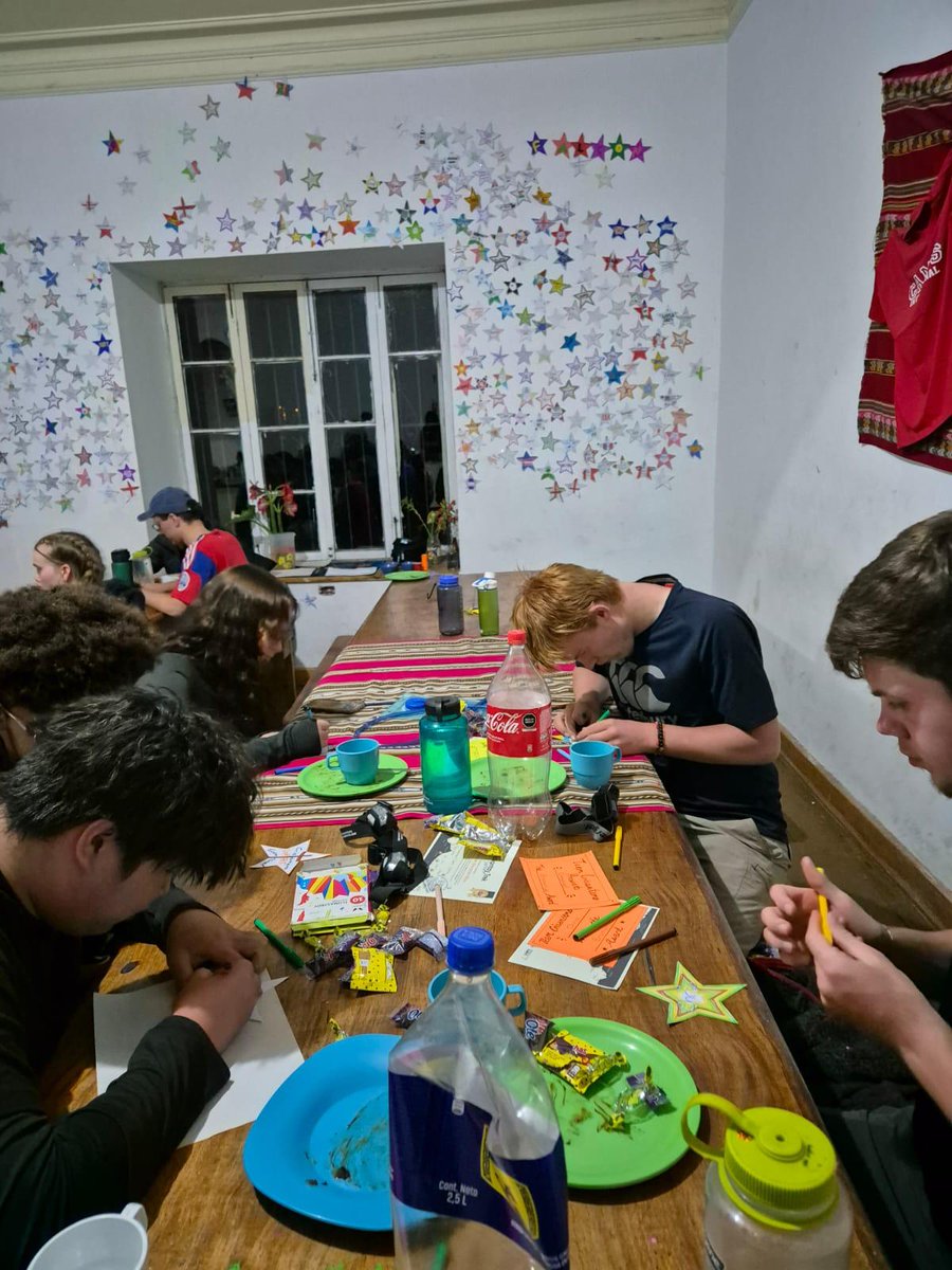 campperu's tweet photo. On the last day in #CampSacredValley, #TeamCrisantemo laid the concrete floor at the Waterfall Ticket office and handed it over to the community. 🙌 They celebrated with a🍕 &amp;  🎂 night and put their 🌟 on the wall. #campseffect @CampsInt https://t.co/dBIzaIjzD8