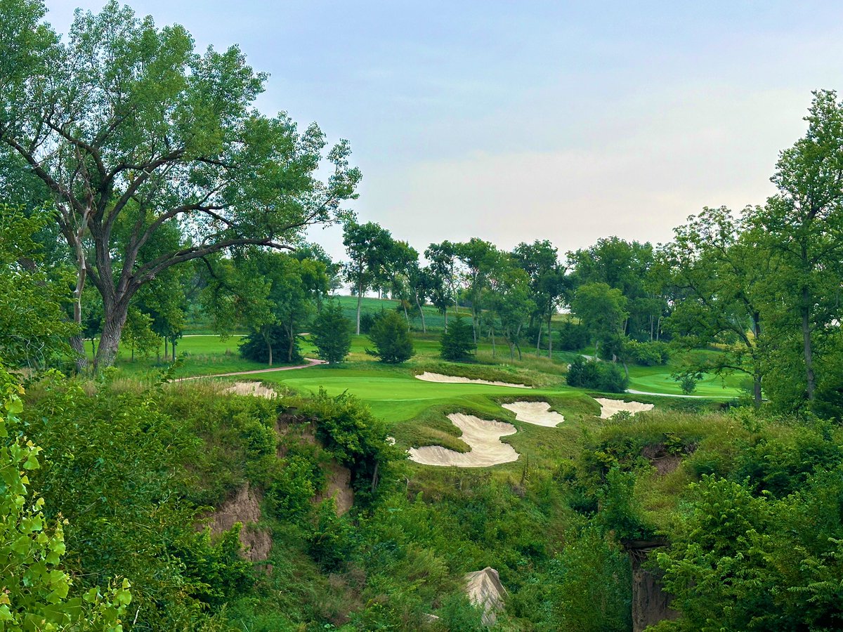Top100Rick's tweet photo. Lost Rail Golf Club - #93/Top 100 
2022 - Scott Hoffman 

WOW. 🤩 

I had heard a lot of hype going in, but you never know how good a golf course is until you’ve walked it yourself. I can tell you, Lost Rail is a top tier golf club in all ways. 

The land is incredible, you can tell it was a very challenging routing. Very hilly with constant ravines to work around, Hoffman was able to not only find a cohesive routing, but he somehow made it very walkable. 

The conditions are absolutely perfect. The turf was extra lush due to recent rains, but still managed to play firm and fast. Aesthetically the entire golf course is gorgeous, the bunkering and fescue creating a classic look, while the fairways and greens add a modern flair. 

I’d describe the play style as modern strategic. Wide fairways mean players won’t have to look for balls too often. But where you land matters, contours often can add 40 yards to your drive if you land in the right place. Safe lines can make a golf hole 50 yards longer. The greens are highly contoured adding lots of fun to the short game. 

The club itself is perfect. 275 single golf memberships, it’s uncrowded. 4 hour rounds are the expectation, our foursome walked in well under. There are no houses on the course, just 20 minutes from Omaha you feel like you are out in nature. The service and food and amenities are all excellent and exactly what you want in a golf club. 

This was Hoffman’s first solo design, but he spent decades as Fazio’s lead designer on the west coast. His experience designing and building places like Gozzer Ranch really shows, Lost Rail is a masterpiece. 

A wonderful day with great friends. One of the best modern golf clubs in the country.