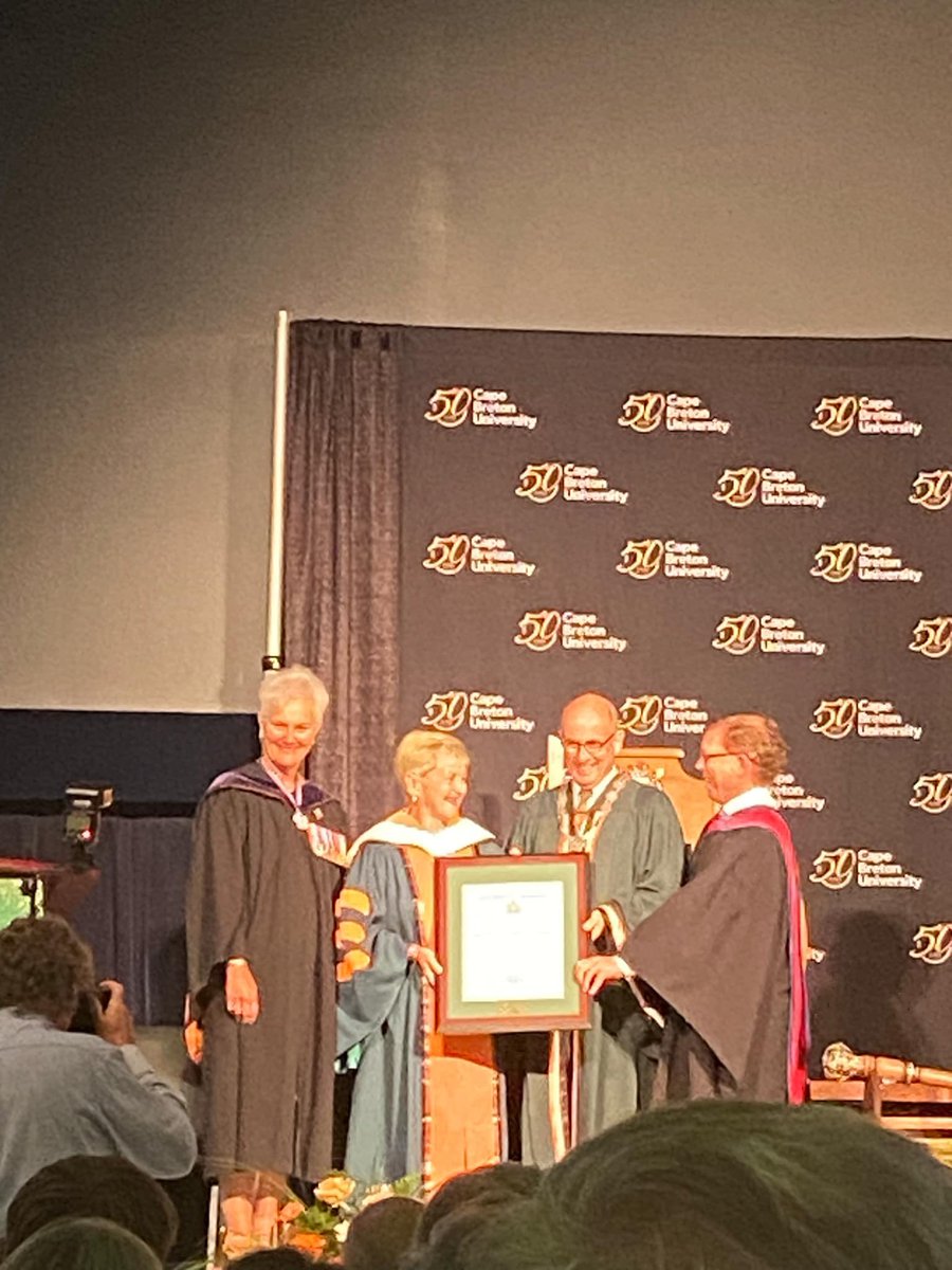 What an honour for our Association to be given an Honourary Doctorate from <a href="/cbuniversity/">CBU</a> yesterday as part of our annual Festival! Betty Matheson, our Director, is seen here accepting the degree from CBU President David Dingwall. Thank you to CBU for recognizing our legacy on CB!