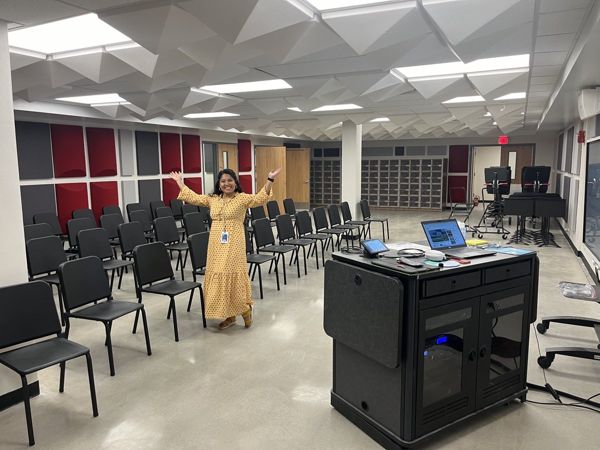 Ms. Hernandez is enjoying her remodeled orchestra classroom at Nowlin MS