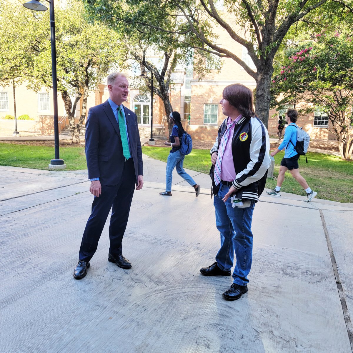 President Keller speaks with students on the first day of classes at UNT's Denton campus. 