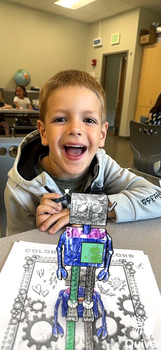 AllisonvilleES's tweet photo. Mr. @sauslander read a book to his Kinders about an e-Motion Robot, Peter O’Meter. Kindergarteners colored a robot sheet and then, using augmented reality, chose an emotion button for Peter and watched him “come to life,” in the same colors as their page.  #WeareAV🐊 https://t.co/TNewFTgOlp