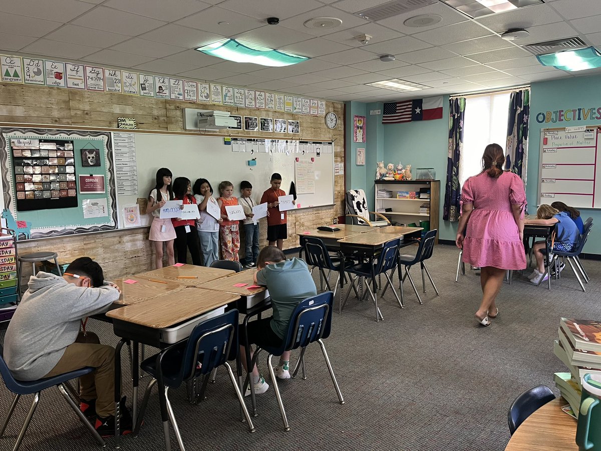 mon_lev's tweet photo. Place Value Heads Up 7-up—such a fun way to learn PV. Students write numbers &amp; clues. Great lesson @rabalais85523 🧡💙
 #LPLegacy #Bestneverrest #MathisFun https://t.co/sTBl7eEzXA