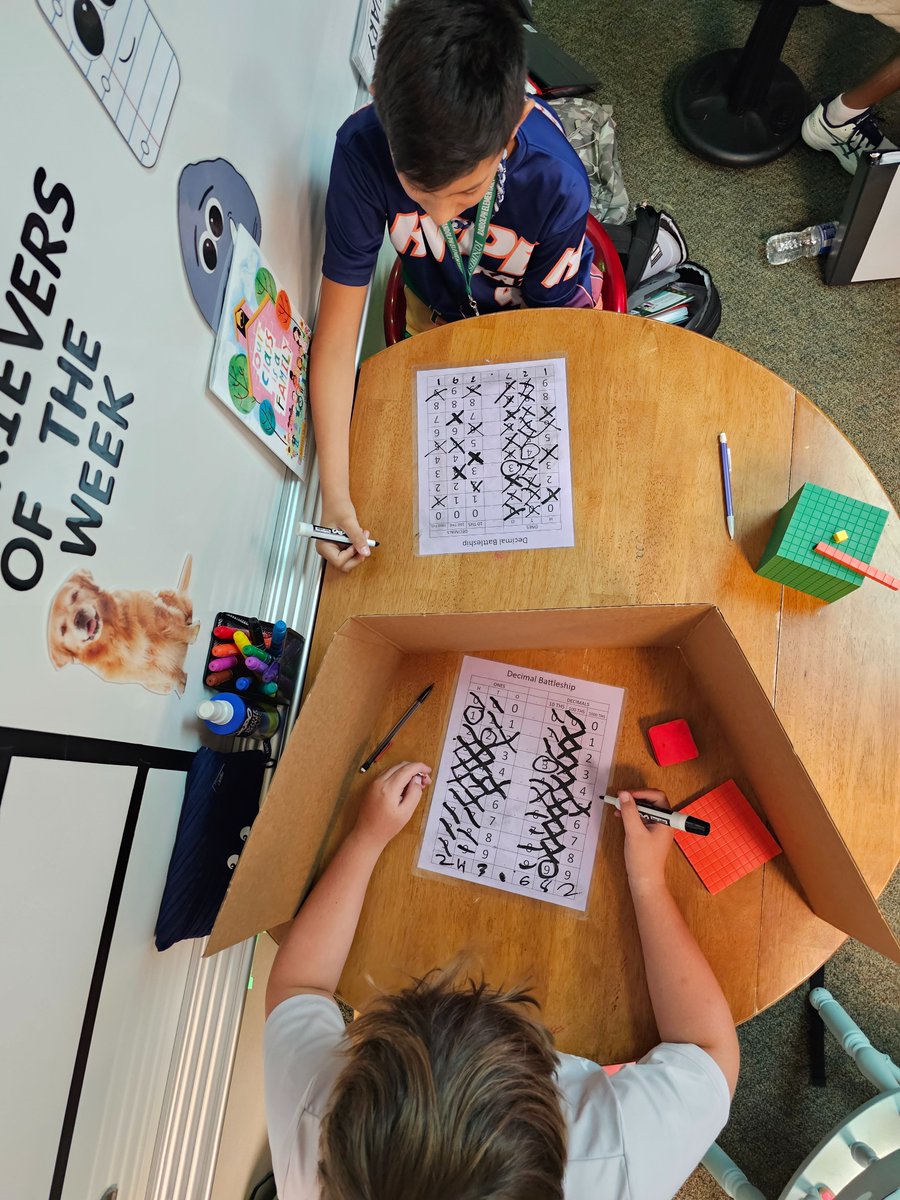 MrsRootJRE's tweet photo. math games are the best!  we started our week with decimal battleship.  #jrerocks #mathisfun #placevalue #decimals #5thgrade #fifthgrade https://t.co/7BRWEPrLWT