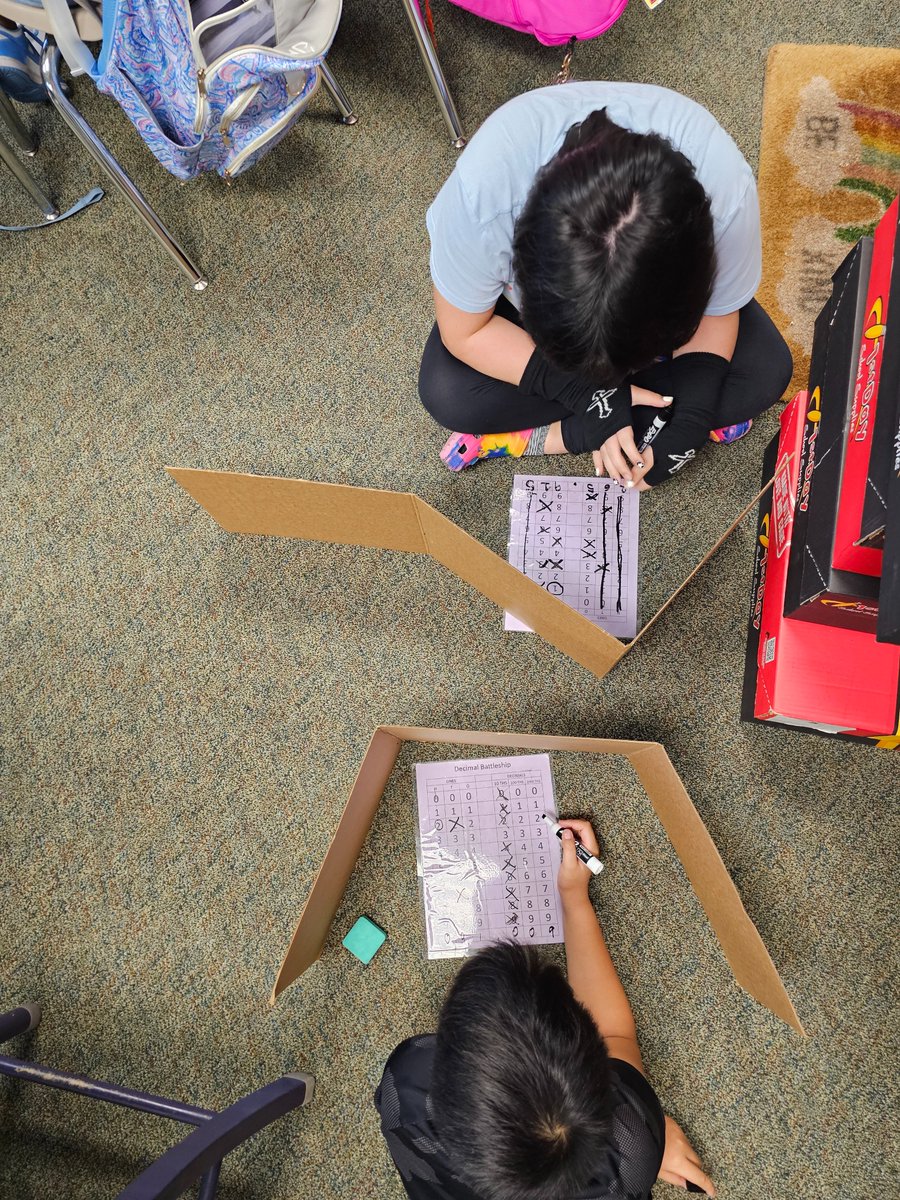 MrsRootJRE's tweet photo. math games are the best!  we started our week with decimal battleship.  #jrerocks #mathisfun #placevalue #decimals #5thgrade #fifthgrade https://t.co/7BRWEPrLWT