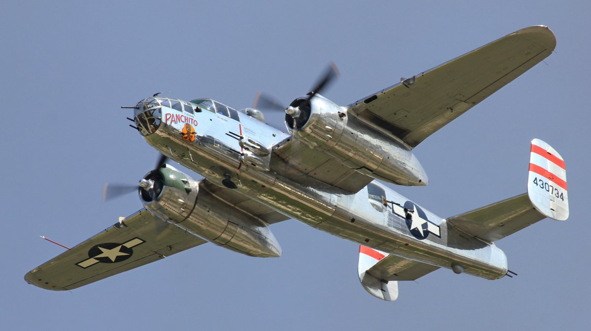 EAA's tweet image. The North American B-25 Mitchell took its #firstflight on August 19, 1940. Here are three B-25s captured at #OSH24 by Al Sauer: Panchito, Devil Dog, and Miss Mitchell. Which is your favorite B-25 still flying?