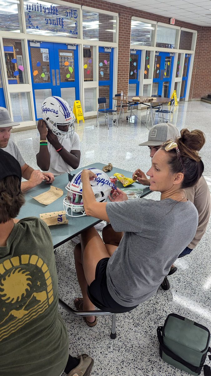 1st Annual "Stickers with Mom" night!  Wonderful having all our Topper families out to help with putting our decals on!  Great way to start our first game week feeling the love and support from our families!  #GoToppers