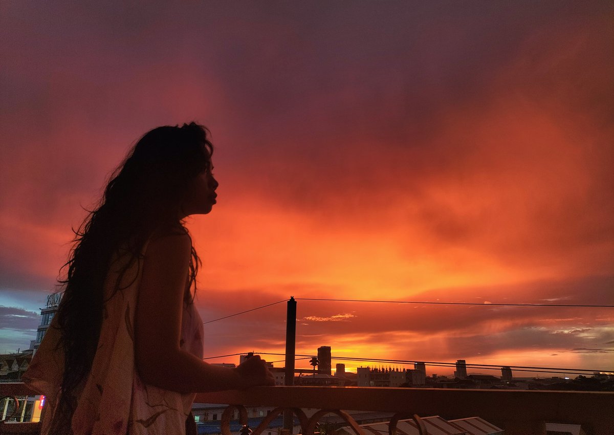 PHNOM PENH AFTER THE RAIN
Woman enjoying sunset after strong rain. Favorite season of the year.

#rain #sky #sunset #sunrise #woman #beautiful #colorful #warm #orange #evening #dusk #magichour #nostalgia #hope #streetphotography #documentary #cambodia #dop #cinematographer