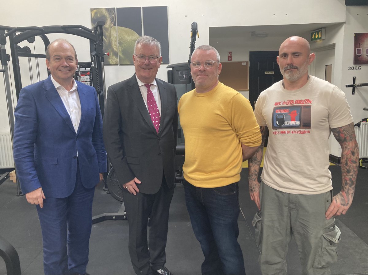 healthdpt's tweet photo. The Health Minister and the Chief Medical Officer today visited Primal Strength and Movement Gym in Lisburn to discuss male mental health.

Michael Draine (in yellow) performed a short monologue which he authored in an effort to raise awareness of mental health issues. Mr Draine's 11-year-old son died by suicide in 2020.