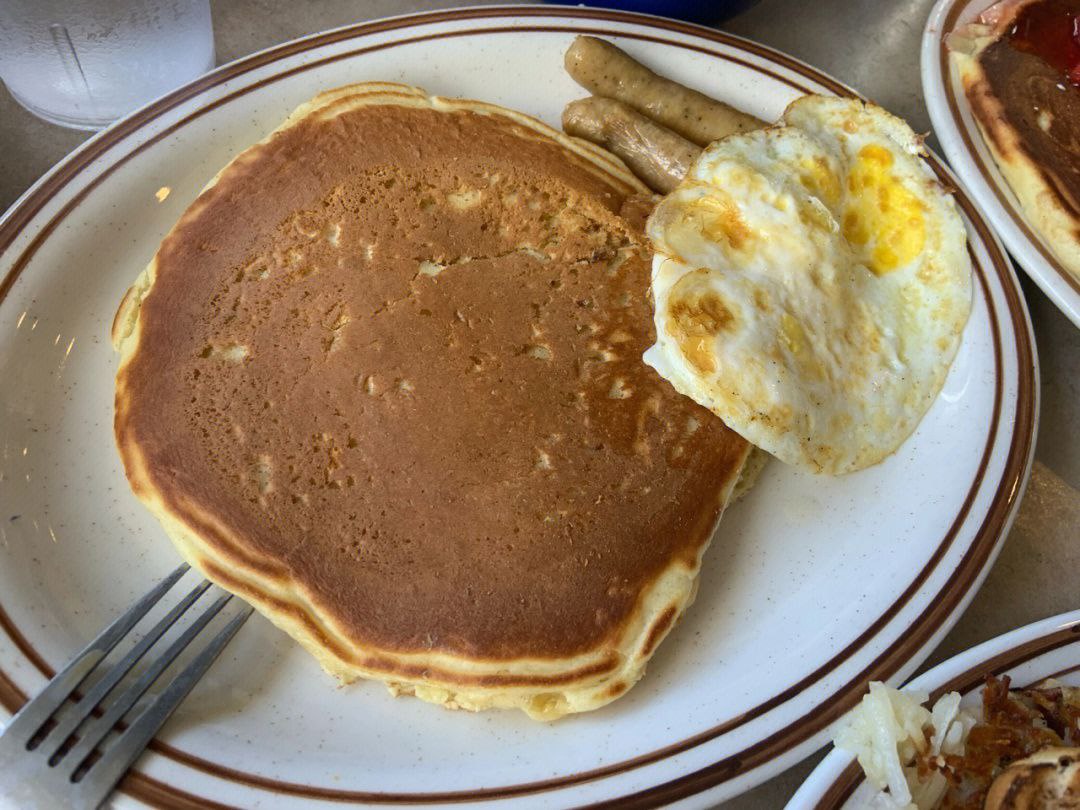 Pancake combination, a Mexican egg roll, toast and mashed potatoes, a cup of coffee #BreakfastClub #breakphoto #BreakingNow