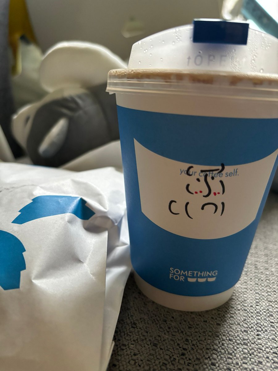 Breakfast. latte and sandwich by Something For.