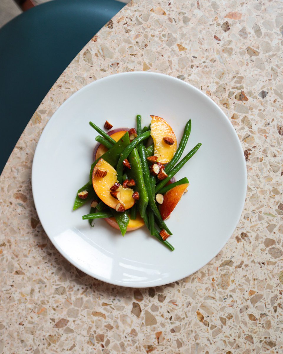 The perfect antipasti for August. Crunchy green beans, juicy peaches and salted almonds Little else needed!
