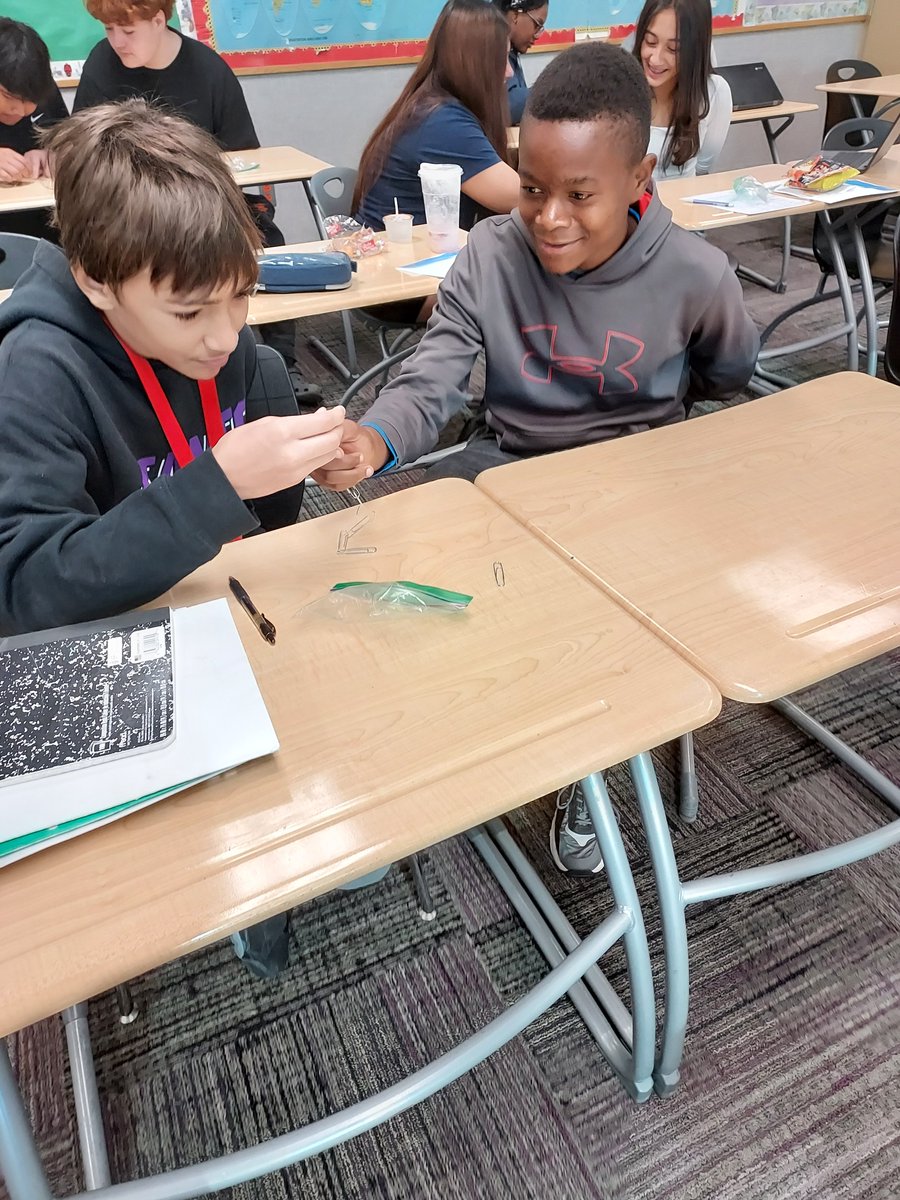 NGCImagination's tweet photo. Students worked together to tackle August's STEM challenge - to unhook a loop of paperclips one-handed. Elijah and Akili had the fastest time in Mrs. LaCanne's class! #NGCPride #WeareWayne https://t.co/Xo14JpMimL