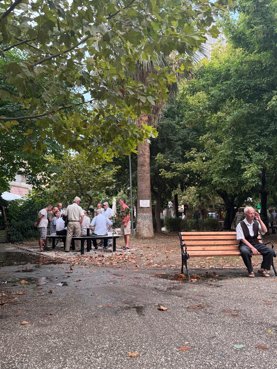 Pawlicker88's tweet image. Literally 12 Albanian bros yakking it up over a game of backgammon in a Central Park on a Tuesday night. 

Living the good life 🫡