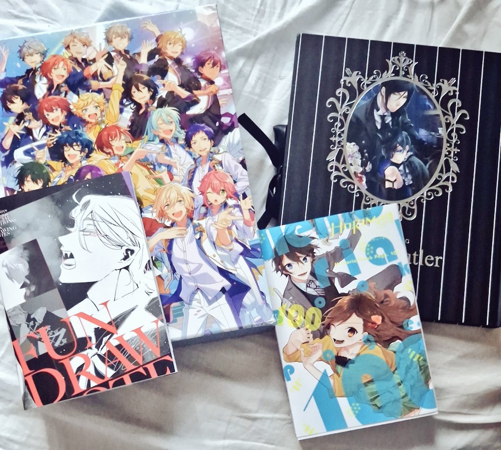 tazuwu's tweet photo. behold my holy grail artbook collection...... someday I'll get all of the enstars and kuroshitsuji ones.... (if you have them and wanna sell them.... I'm here....) https://t.co/RPku0UvI3v