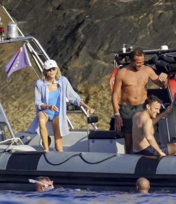 MattWallace888's tweet image. ZOOM IN!!!!! What do you notice about this picture of Brigitte Macron enjoying a nice day out on the water?