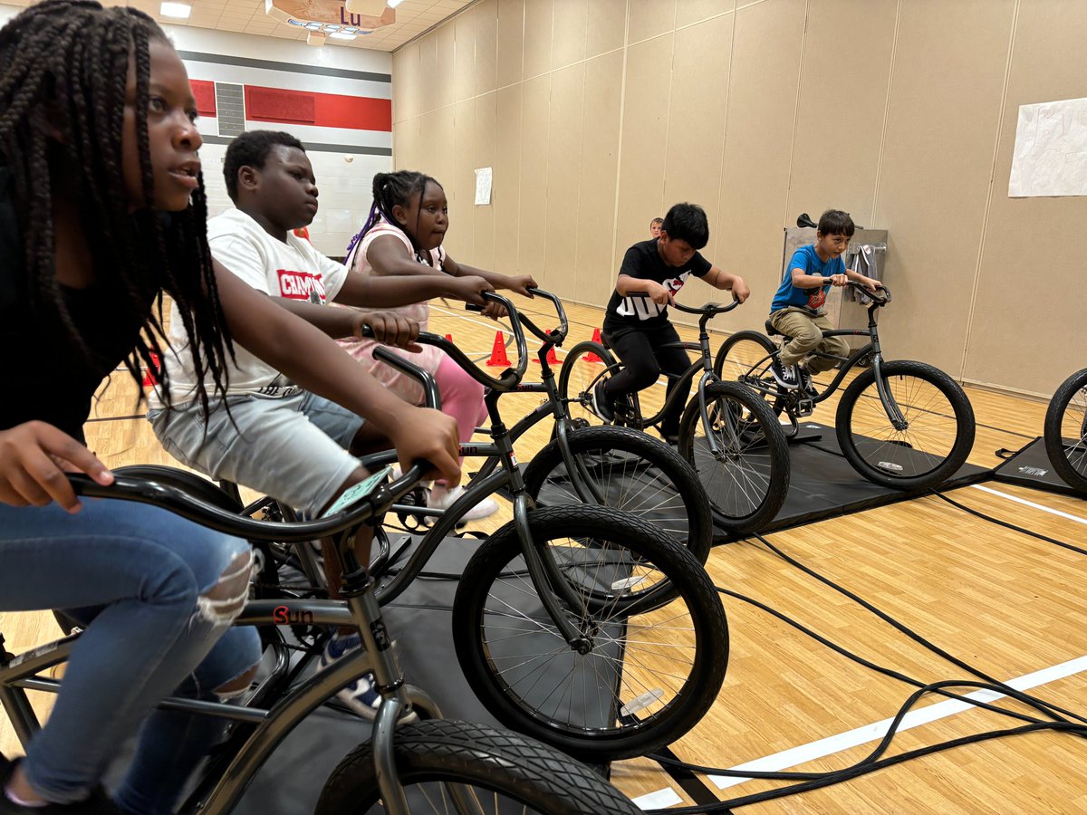 Nine13sports's tweet photo. Focus. Determination. Sportsmanship. and MORE! Students in @MrDsNoraGym1 class, at @NoraElem, are spending the week with our #KidsRidingBikes team and loving it! https://t.co/6RbvDQV089