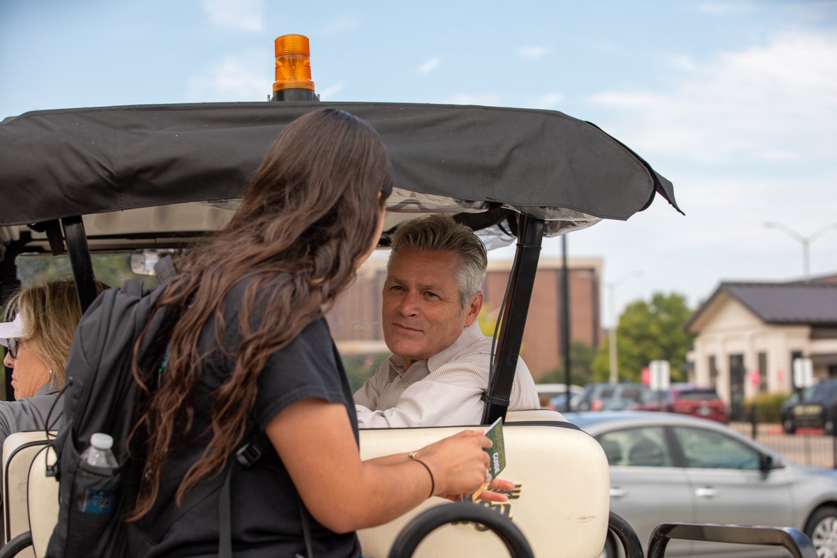 PresidentWSU's tweet photo. Starting the semester off right by driving students to class along with @DrTeriHall in our #Wuber! The first week is full of excitement and energy, and I am thrilled to welcome Shockers back to campus! 🚕 🌾 #ShockersUp https://t.co/uuCVtIfqeZ