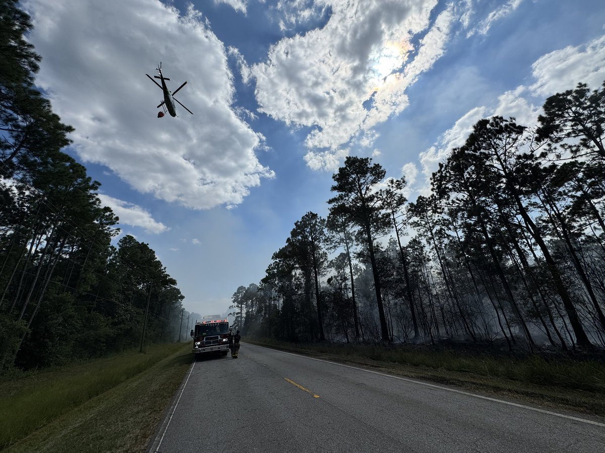 Firefighters from <a href="/FLForestService/">Florida Forest Service</a> , Avalon Volunteer Fire Department and Midway Fire District have the fire south of Mary Kitchens Road along Garcon Point Road 60% contained at 12 acres. 
Roads are reopened and evacuations lifted. Officials will monitor throughout the night.