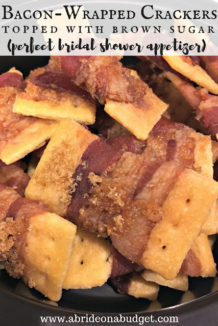If you're making food for your own bridal shower, easy foods that everyone will enjoy should be your go to.

Something that absolutely fits that criteria is our Bacon-Wrapped Crackers: abrideonabudget.com/2018/01/bacon-…

They're so simple and insanely good.

#NationalBaconLoversDay