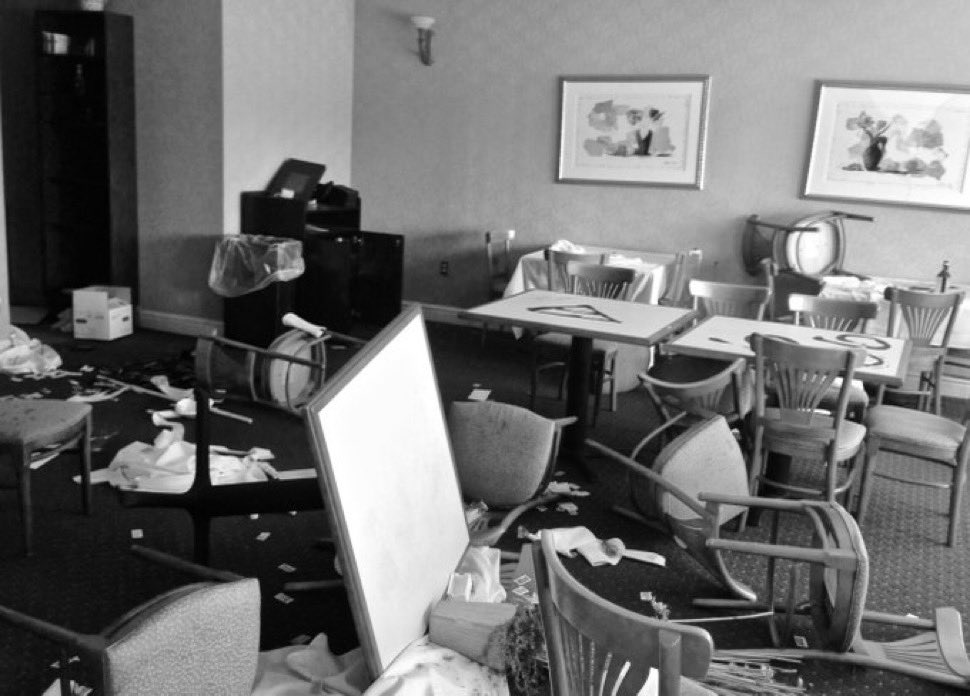BeschlossDC's tweet photo. At a NJ golf club, irate owner has apparently trashed his own Men’s Grill room while watching live TV coverage of huge jubilant crowd packed into Milwaukee convention hall (formerly site of Republican convention) to cheer Harris and Walz. https://t.co/txdtUPUCdl
