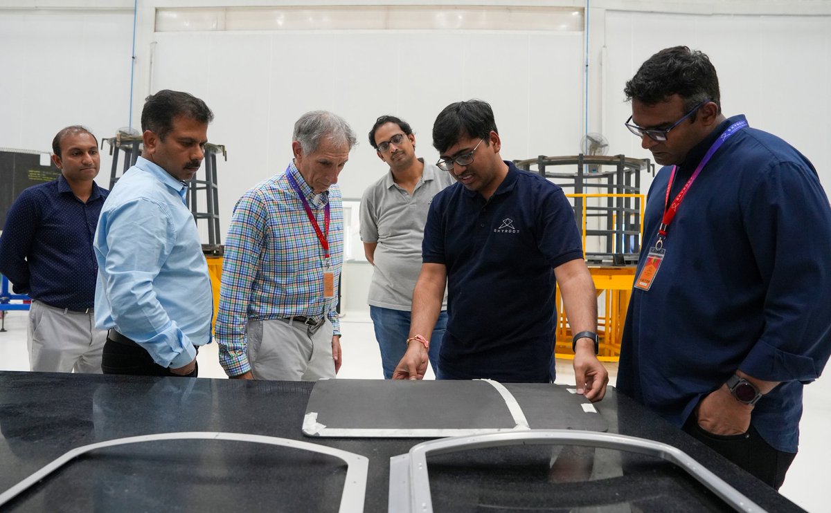 SkyrootA's tweet photo. The future of space is being shaped at MAX-Q! 🚀 

We had the pleasure of hosting the leadership team of @viasat, a global leader in satellite communications, at our headquarters! Viasat's Mark Dankberg (Chairman & CEO), K. Guru Gowrappan (President), and Ravi Namboori (CDO) were provided with an exclusive tour of the cutting-edge technology that makes our Vikram-1 launch vehicle. 🌠 

 #SpaceTech #OpeningSpaceforAll