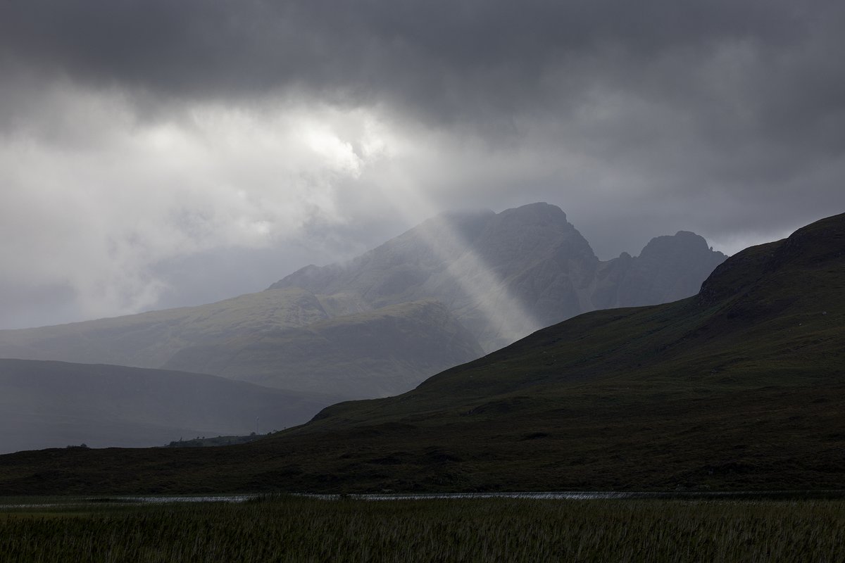 A quick roadside stop on the way to Elgol last week, to capture this beam of light in front of Blà Bheinn. #IsleofSkye #Scotland