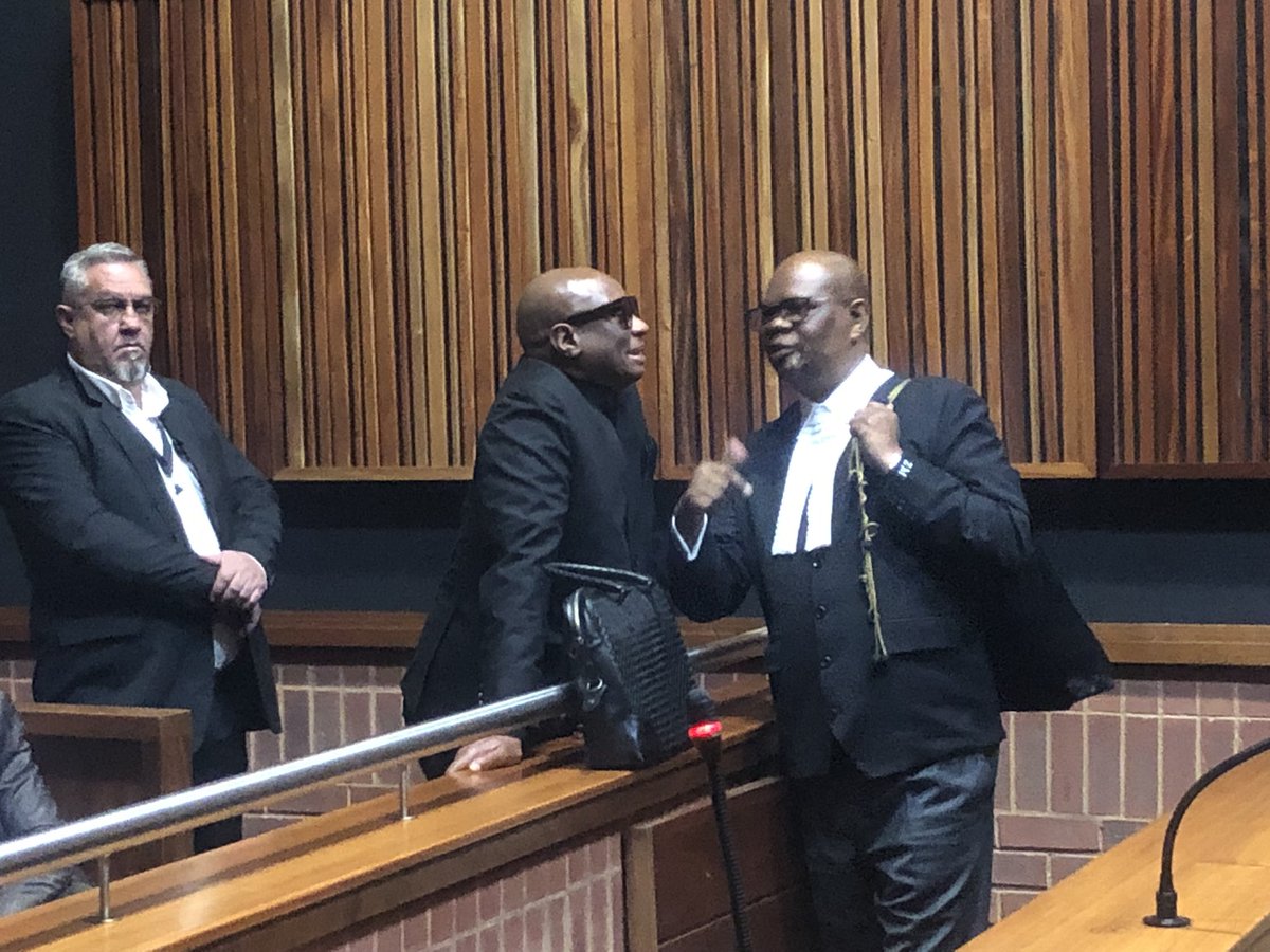 Former Sports, Arts and Culture Minister Zizi Kodwa talks to his legal representative Advocate Zola Majavu ahead of his third appearance at the Palm Ridge Specialised Commercial Crimes Court this morning.