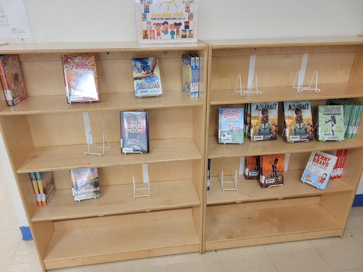 MrsMediaJTE's tweet image. Monday was our first day of book check out &amp;amp; I walked in today to our @FloridaSSYRA shelf looking like this. I call that success! #comeandgetem #morebooks @emapbc @LibraryCurrent