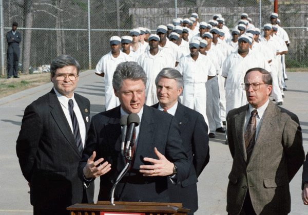 corpseinorbit's tweet photo. Also, not really connected, but just for the sake of memory's old sweet song, Bill Clinton responded to "soft on crime" criticism by giving a speech with a couple dozen prison inmates, all black, in front of the largest Confederate monument in the United States https://t.co/tIIyLBHOk8