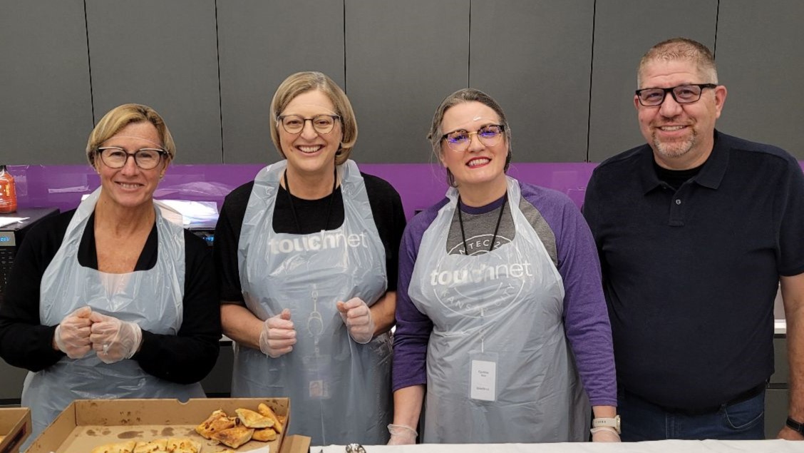 TouchNet's tweet image. 🎒🍕 &quot;Back to School&quot; vibes were in full swing in our Kansas City office yesterday! 🍕🎒

We celebrated the start of the new school year with a classic cafeteria lunch: square-cut pizza, cinnamon rolls, and a few of our own &quot;lunch ladies&quot;. #BackToSchool #TeamTouchNet