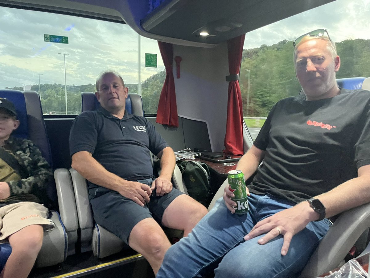 The boys having a debrief at the back of the coach! Lovely for Finton to find a friend of his age on a battlefield holiday @Delville1916