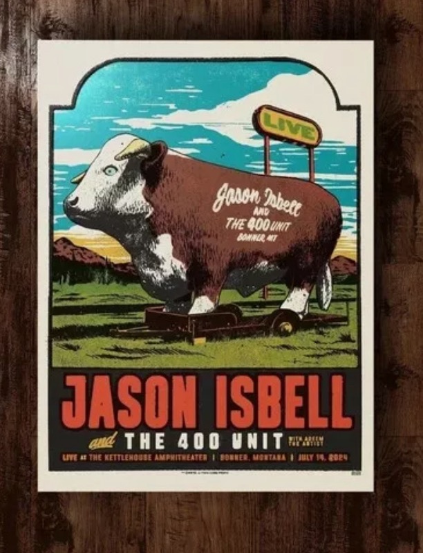 StarbrightHQ's tweet photo. My friends in Missoula who went to see #Isbell day after we spread Cam's ashes [in my stead since I was emotionally unready to hear IWWV &amp; 🐘] just sent me a pic of  tour poster. This big cow is at the junction of Seeley Lake going up to Holland Lake where my love rests in ☮️. https://t.co/bFgVneyKFR