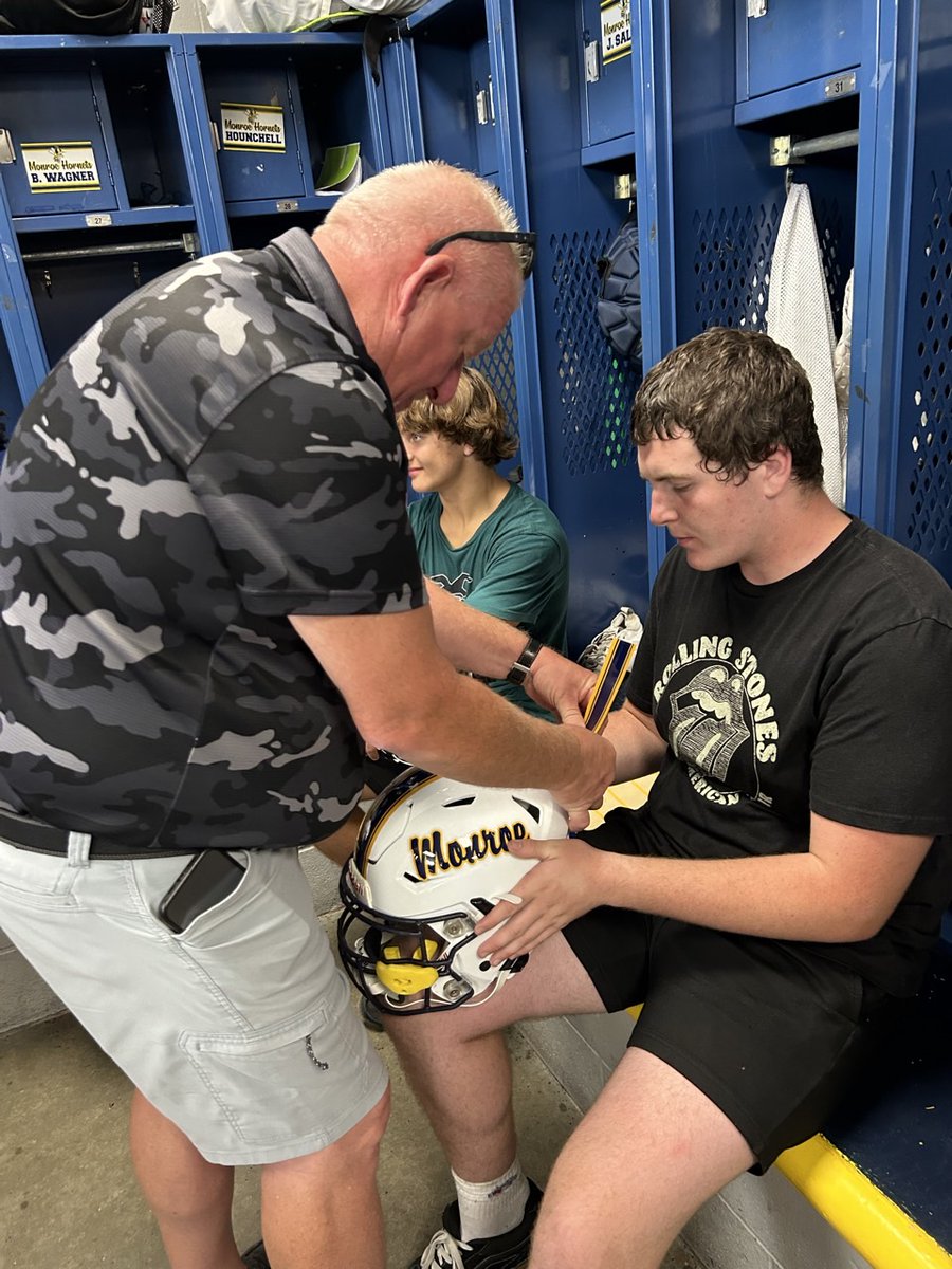 Great night with the players and their dads or a special person helping the men put on their decals! #hornetsfinish!