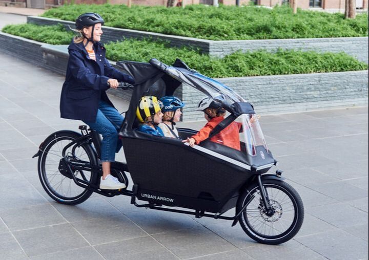 but_cyclists's tweet photo. You can't take 3 kids to school on a bike https://t.co/yWNoOYQtNO
