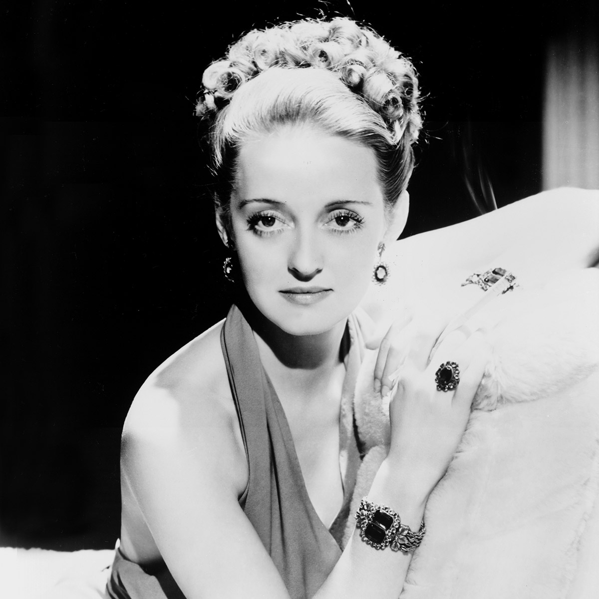 A strong-willed, independent woman with heavy-cast eyes, clipped New England diction, and distinctive mannerisms, Bette Davis left an indelible mark on cinema history as being one of Hollywood's most important and decorated actresses. #SummerUnderTheStars