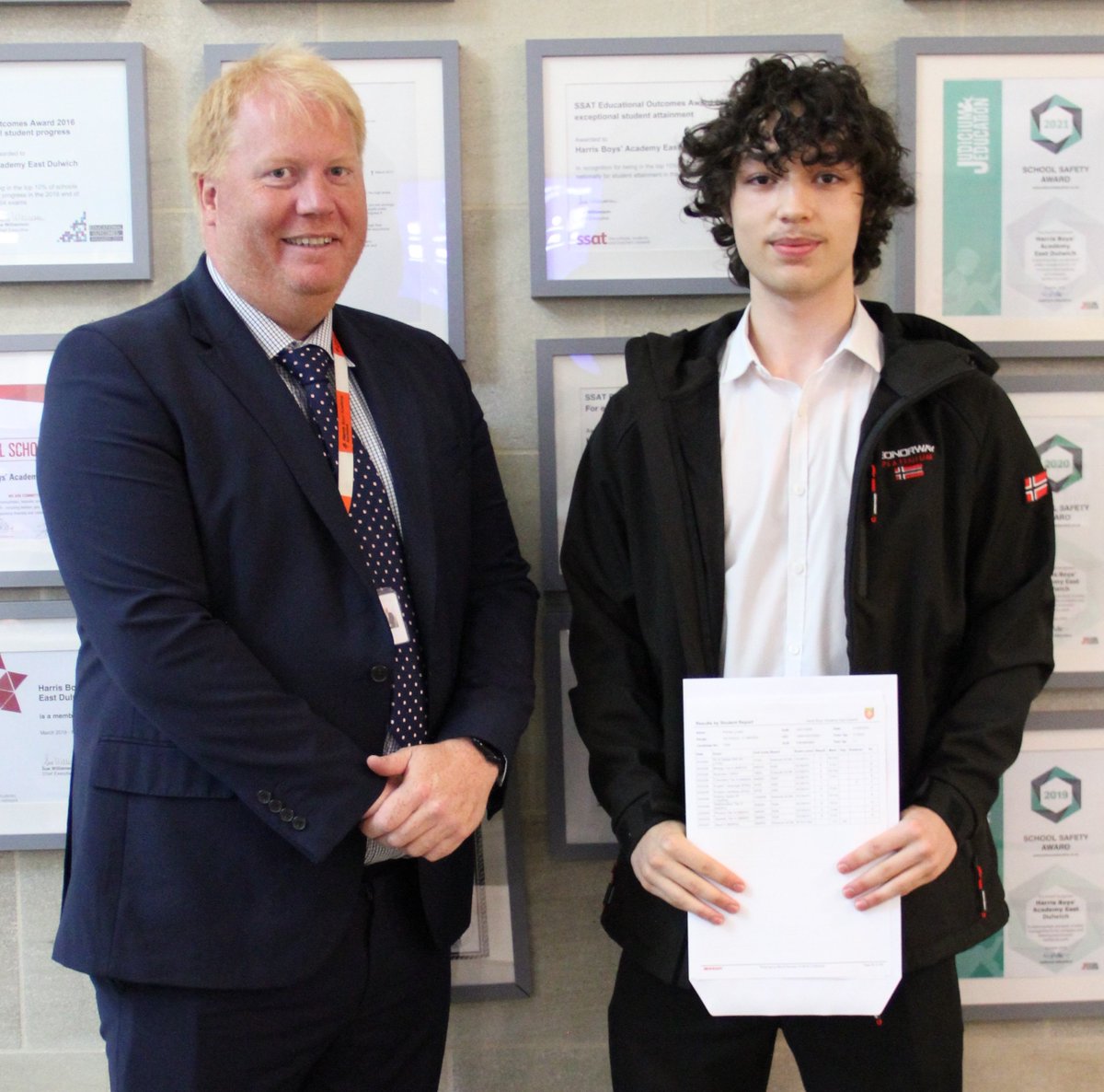 Mr Brett pictured with Stanley, who achieved nine Grade 9s and two Grade 8s, and Lucas, who achieved six Grade 9s, three Grade 8s and one Grade 7. Congratulations to our students, staff and parents for our best ever results.  harrisdulwichboys.org.uk/28/… Image