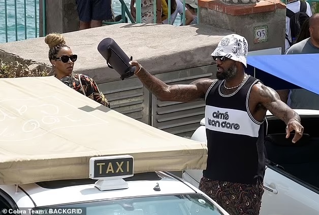 ESPNsavages's tweet photo. LeBron and Savannah shared an intimate moment with a few drinks on deck during their outing in Capri https://t.co/UtxkJ4Q0wQ