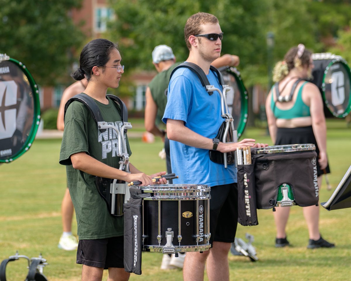 PNNMB's tweet photo. Our band is hard at work, fine-tuning every detail. We can't wait to bring the excitement to the field for gameday! ⛏️💚 #pnnmb #goniners #unccharlotte https://t.co/xeGpYVOxsK