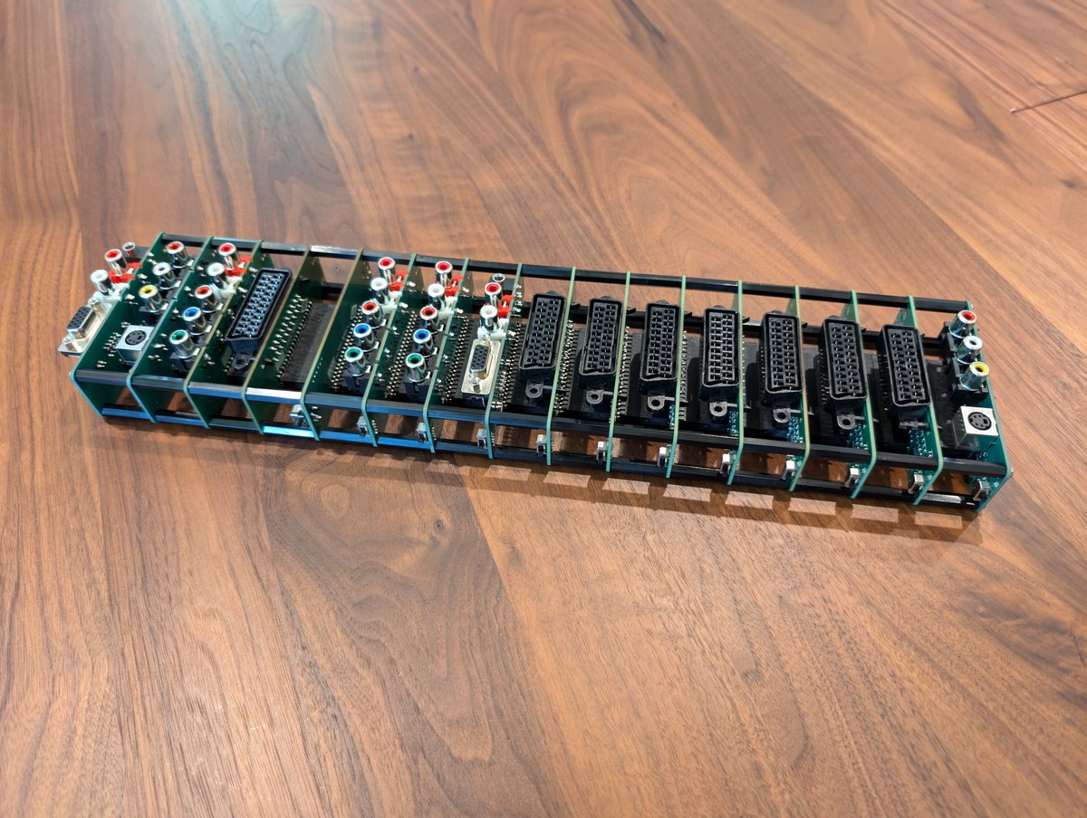 Arthrimus's tweet image. New Scalable Video Switch prototype. This version has the new serial communication system implemented so the control board is no longer limited to 8 inputs. This example has 11 inputs and 4 outputs. I now have VGA and Composite/S-Video inputs and outputs working as well.
There…