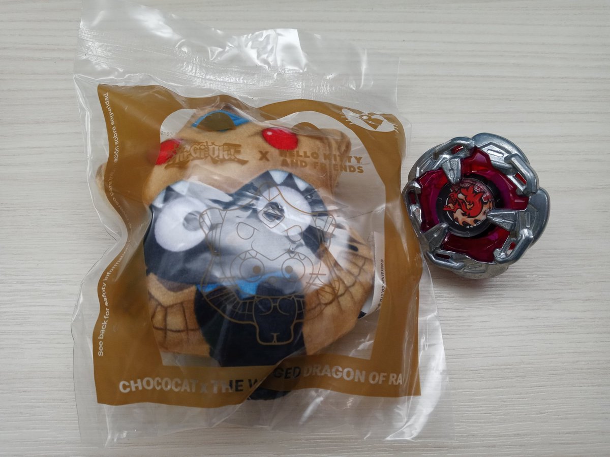 mandokirby's tweet photo. Look who I got at McDonald's today! Featuring one of my Beyblades #yugiohxhellokitty #BEYBLADEX https://t.co/CElIBV2t2S