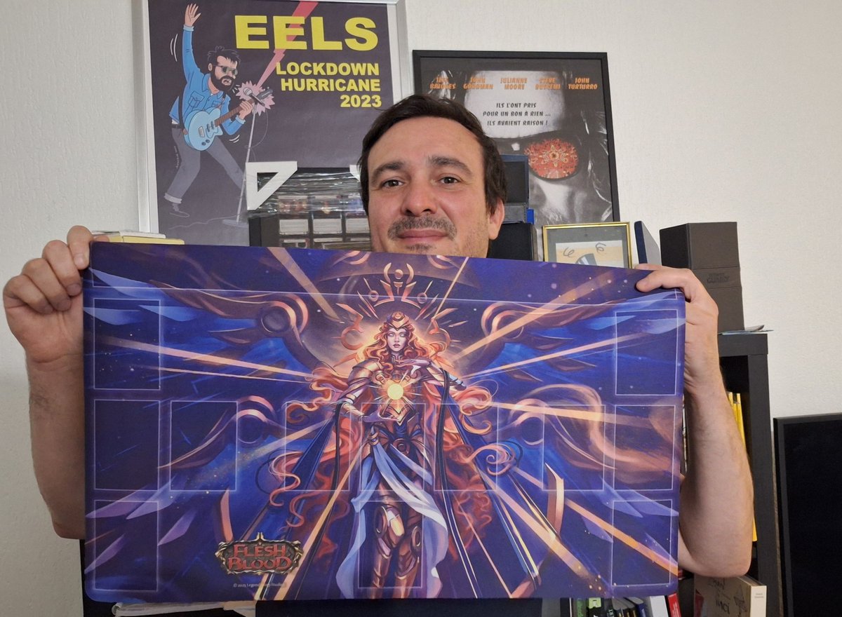 Fiesta-Exclusive Suraya, Archangel of Erudition Playmat, with gorgeous art by @AsurArt, to be given away during the event on Saturday