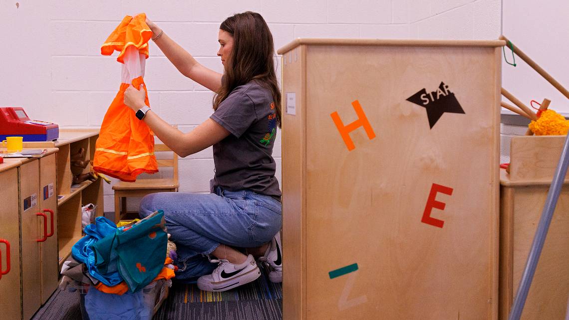 Emily Brugler, a first-year pre-kindergarten teacher, prepares her classroom at <a href="/SouthLakesEl1/">South Lakes Elementary</a> on Thursday. Brugler was recruited to join the Wake County school system's Future Teachers Program after graduating from <a href="/FuquayVarinaHS/">Fuquay-Varina HS</a> in 2020. Photo via Kaitlin McKeown. #wcpss #nced