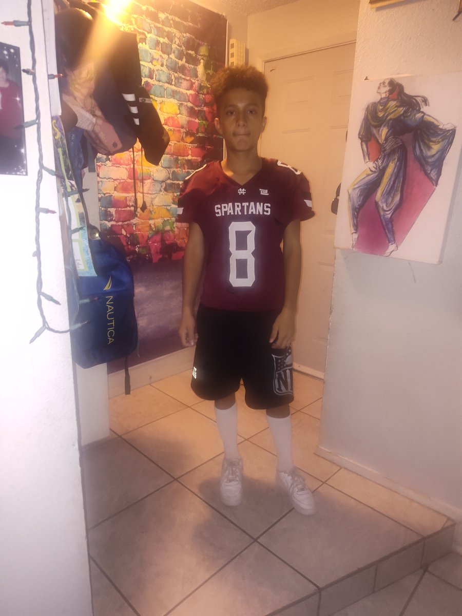ERICKAJADE's tweet photo. Nick had his 1st game this evening! Here's him this morning in his uniform, + he insisted on me being in a  photo even though I had just woken up 😴 😭. ( They lost.) #nickvegas #slicknick  #2ndchild #firstson #myfirstprince #football #highschoolfootball #gospartans #jv #8 https://t.co/PZG2f93QVZ