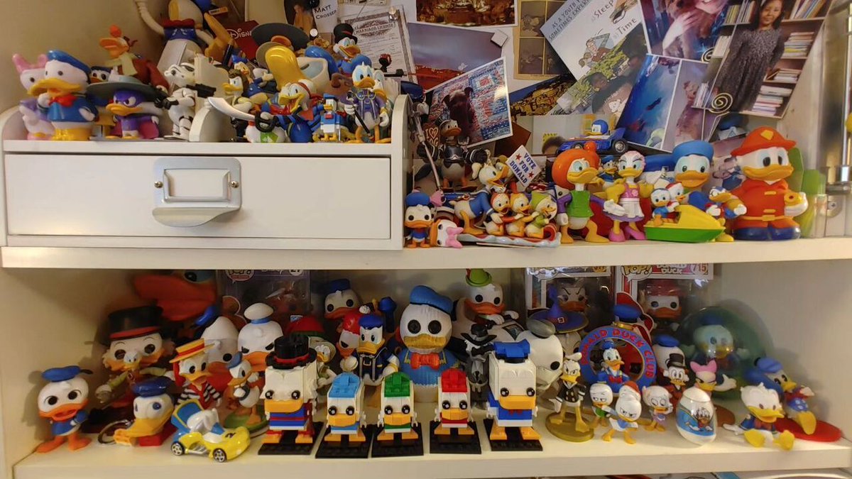 mcrosser's tweet photo. I finally reworked my Donald Duck collection. This is 90% of it. A little is in storage. Plus I have Hardbacks of many comics of Donald Duck and Uncle Scrooge. I love this sea of white blue and yellow! Who is your favorite Disney character? #toycollector… https://t.co/wPyIqedgf7 https://t.co/G6mB9jSNGB