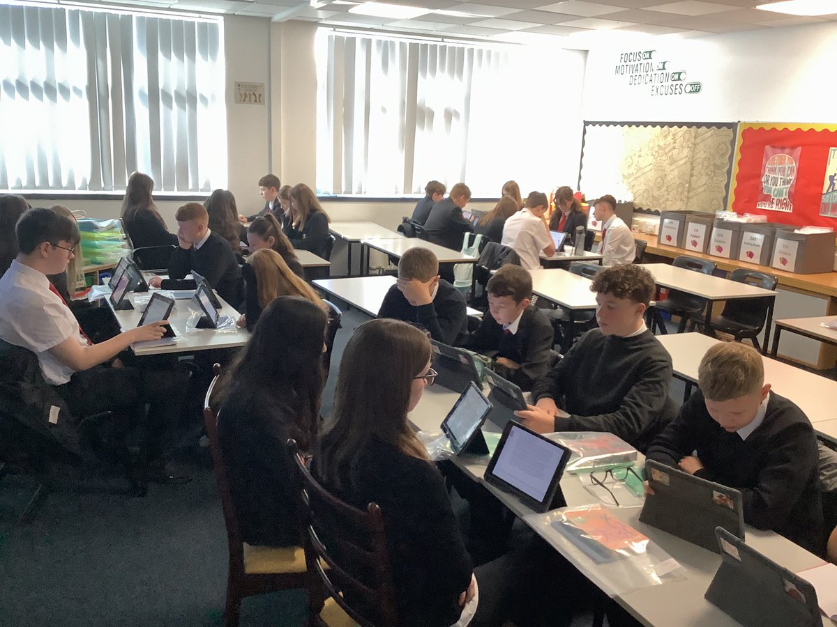 S3 looking very serious about their group task: reading news articles and creating RUAE questions to challenge their peers! #article29 #RAP #earnsuccess
