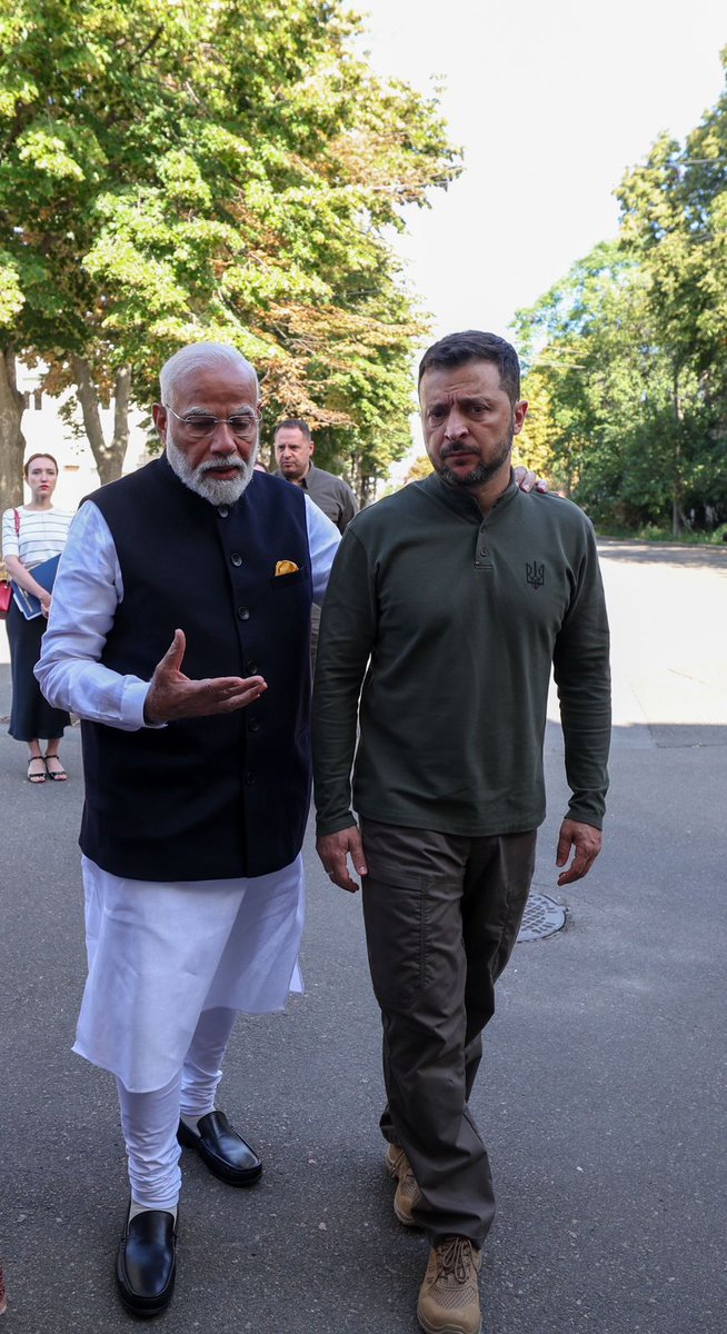 ians_india's tweet photo. In Pictures: PM Modi and Ukrainian President Volodymyr Zelenskyy pay tribute to the memory of children at the Martyrologist Exposition in Kyiv https://t.co/j76j7kdH5b