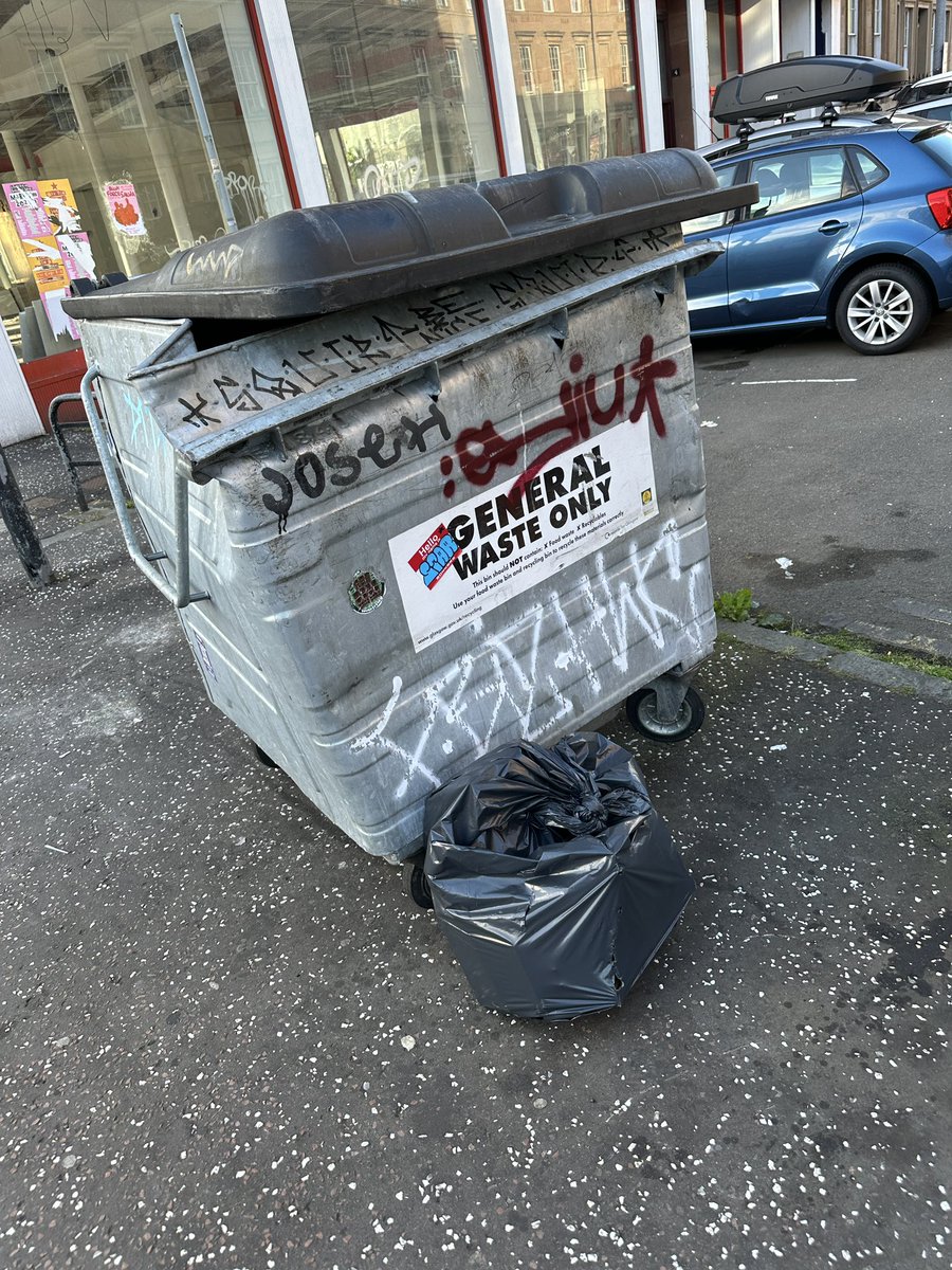 FullerLabGlas's tweet photo. @MyGlasgowCC one of the big bins at the junction of Baliol St and Woodlands Rd has been completely trashed. Bent out of shape and wheels can’t hold it (see pic 1) and for the last week sitting upside down in a parking spot. Can it be removed and replaced? https://t.co/cDBKeDqG2T