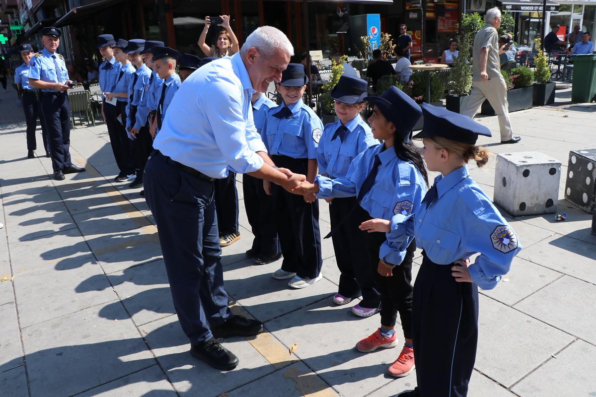 XSvecla's tweet photo. Delighted to see children from all communities in police uniforms taking on the role of patrol officers and educating citizens on traffic safety before the start of the school year. I was very impressed by the dedication and passion they showed for a safer community for all. 🇽🇰 https://t.co/naTPaXV6HC